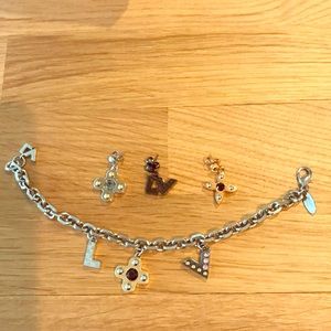 Louis Vuitton set. Trio earring and bracelet